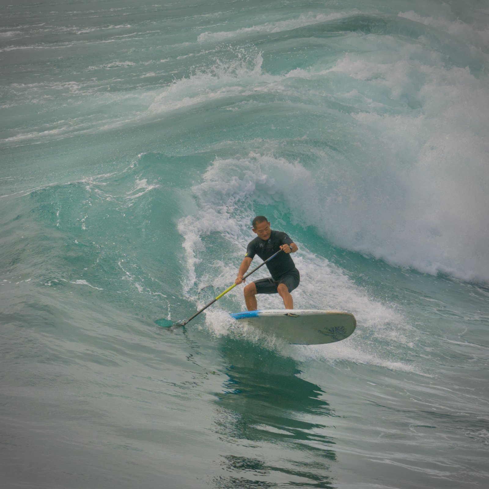 Surfer at Honolii