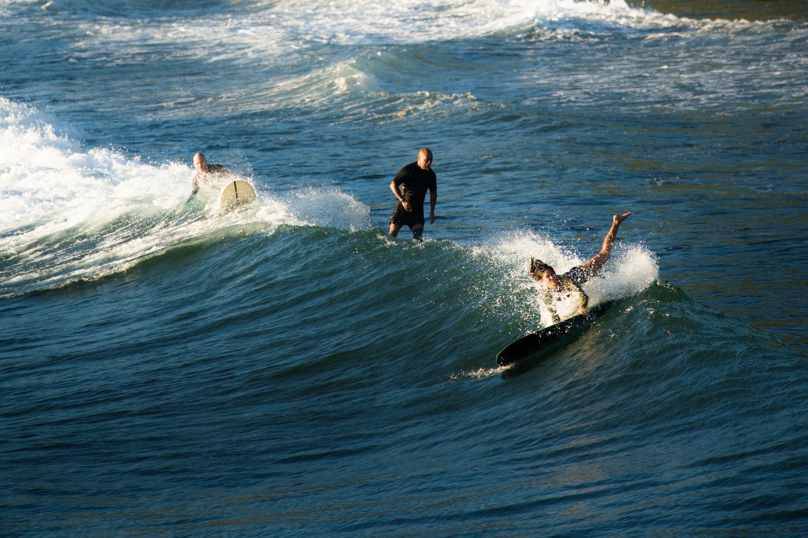 Surfers at Honolii