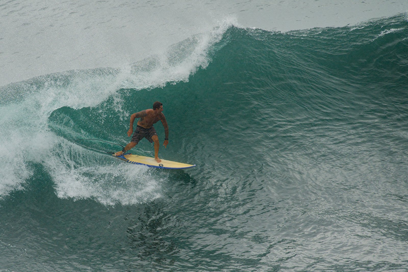 Surfer at Honolii